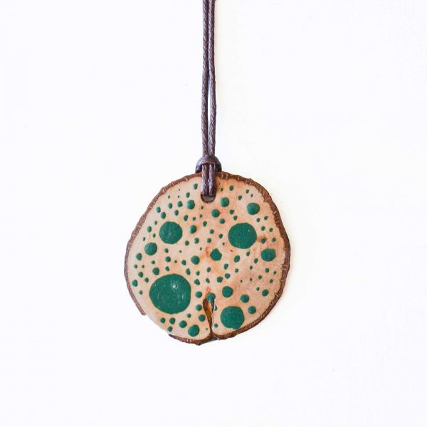 Wooden pendant necklace with green dots